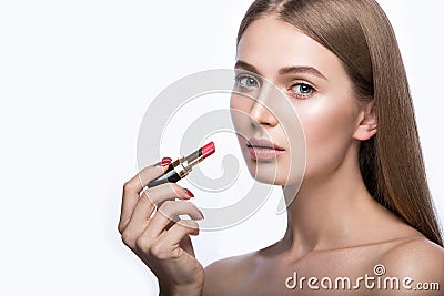 Charming young babe with lipstick and light makeup. Stock Photo