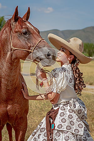 Charra with her horse Stock Photo
