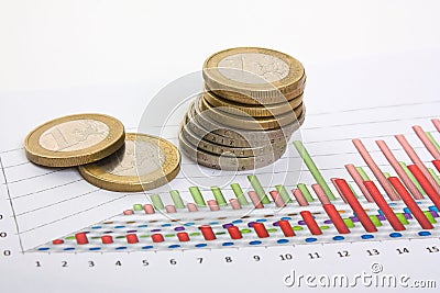 Charts and coins Stock Photo
