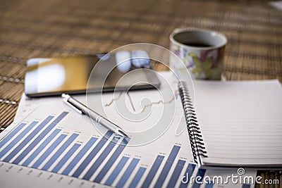 Charts of growth on wood background Stock Photo