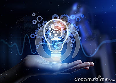 Chat Bot Automating Customer Interaction and Support with Human Hand Holding Lamp Hologram Stock Photo