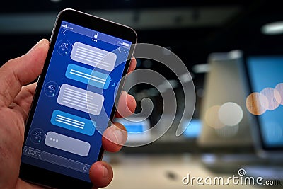 Chatbot conversation with smartphone screen app interface and artificial intelligence technology Stock Photo