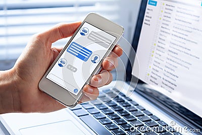 Chatbot conversation on smartphone screen app interface with artificial intelligence technology providing virtual assistant Stock Photo