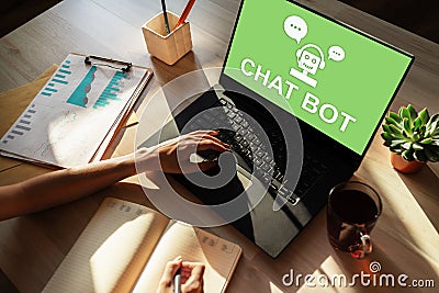 Chatbot icon on device screen. Customer Support automation concept. Stock Photo