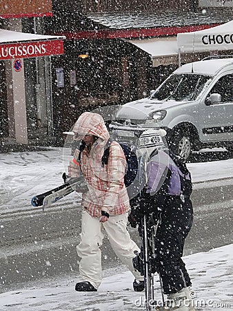 Skiers come back to town in a snowstorm Editorial Stock Photo