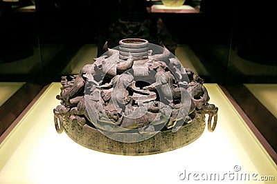 [Museum treasure 23]-Drum Stand With Openwork Coiled Dragon Design bronzeware.Shanghai Museum, China Editorial Stock Photo