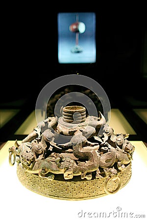 [Museum treasure 23]-Drum Stand With Openwork Coiled Dragon Design bronzeware.Shanghai Museum, China Editorial Stock Photo