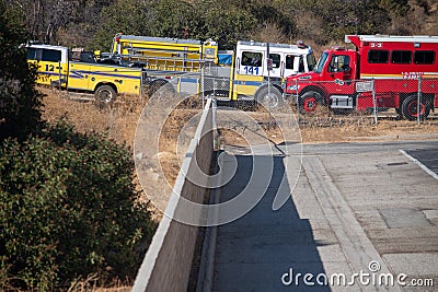 Firetrucks and crews from LACFD and VCFD arrive on scene to fight a brushfire Editorial Stock Photo