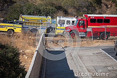 Firetrucks and crews from LACFD and VCFD arrive on scene to fight a brushfire Editorial Stock Photo