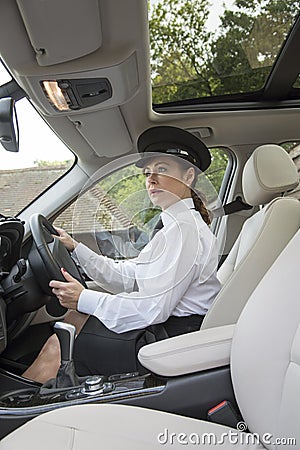 Chauffeur driving car Stock Photo