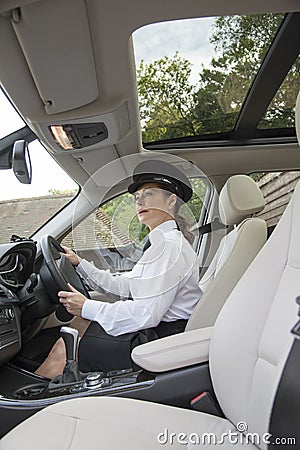 Chauffeur driving car Stock Photo