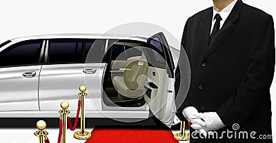 Chauffeur standing by the white limousine Stock Photo