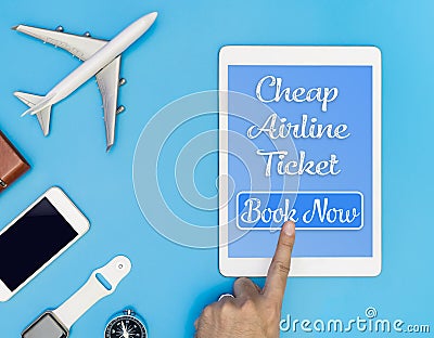 Cheap Airline ticket click button on tablet Stock Photo