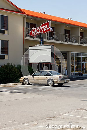 Cheap Motel & Old Style Sign Stock Photo