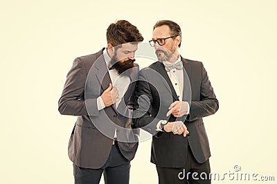 Check clock. Business people formal clothes having different opinion about time. Time management and discipline. Improve Stock Photo