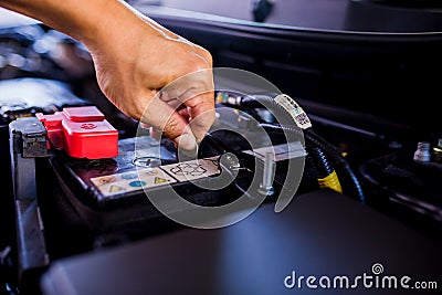 Check and maintenance the battery in car with yourself Stock Photo