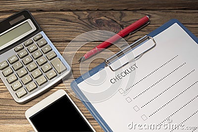 Check sheet form, calculator, smartphone Stock Photo