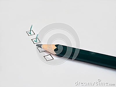 Checkboxes with pencil Stock Photo