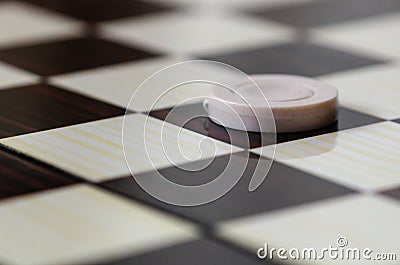 Checkerboard with checkers. Game concept. Stock Photo