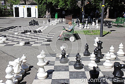 Checkers game, Park des Bastions, Geneva, Switzerland Editorial Stock Photo