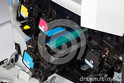 Checking and changing the printer equipment cartridges tone of laser jet multi function printer in the office. Close-up shot of Stock Photo