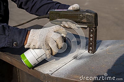 Checking defect in welded with process Magnetic Particle TestingMT Stock Photo