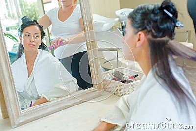 Checking hair at hair salon Stock Photo