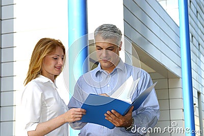 Checking the report. Stock Photo