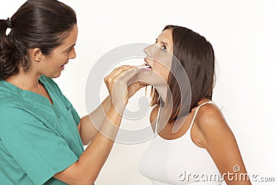 Checking for sore throat Stock Photo