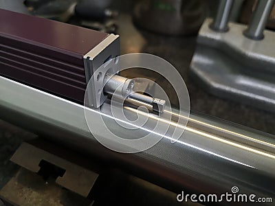 Checking Surface Roughness machining part by roughness tester machine Stock Photo