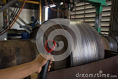 Checking temperature heat steel during welding Stock Photo