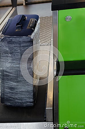 Checking the weight of luggage in the airport Stock Photo