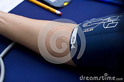 Checking woman patient arterial blood pressure, Health care concept Stock Photo