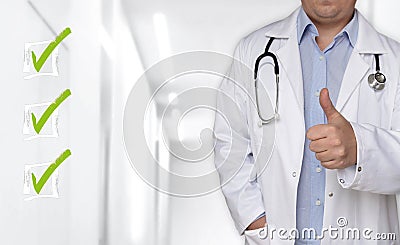 Checklist concept and doctor with thumbs up Stock Photo