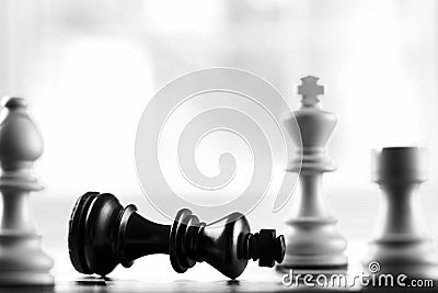 Checkmate white defeats black king Stock Photo