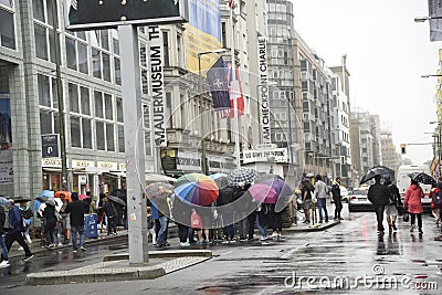 Checkpoint Charlie In Berlin Germany in the pouring rain Editorial Stock Photo