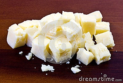 Cubed cheddar cheese. Stock Photo