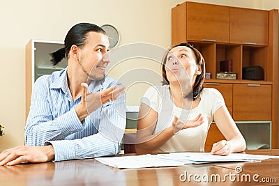 Cheeful couple fills in the questionnaire Stock Photo