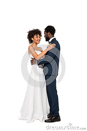 African american bridegroom and bride hugging isolated on white Stock Photo