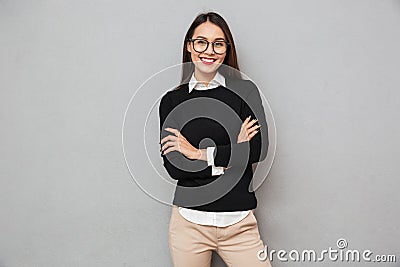 Cheerful asian woman in business clothes and eyeglasses Stock Photo