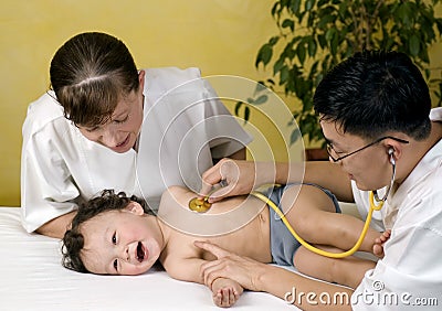 Cheerful baby at the doctor. Stock Photo