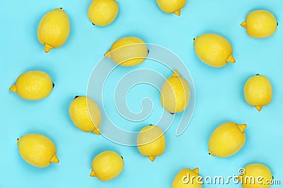 Cheerful background with yellow lemons. Stock Photo