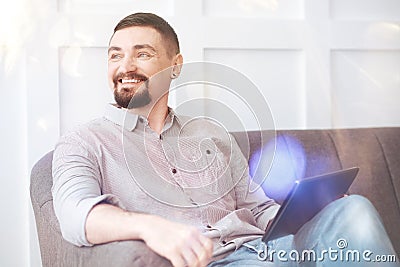 Cheerful bearded man smiling Stock Photo