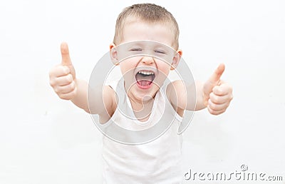 Cheerful boy with thumbs up Stock Photo