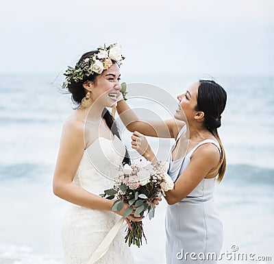 Cheerful bride at the beach Stock Photo