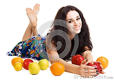 Cheerful brunette with fresh fruits Stock Photo