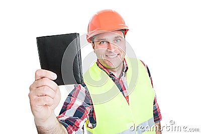 Cheerful builder showing black leather wallet Stock Photo