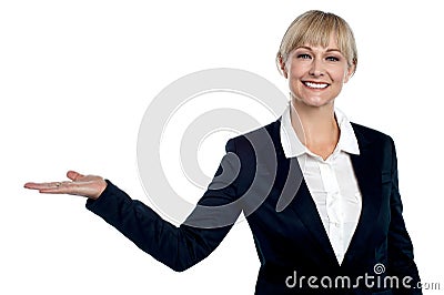 Cheerful business executive presenting copy space area Stock Photo