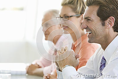 Cheerful Businessman In Conference Room Stock Photo