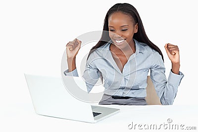 Cheerful businesswoman working with a notebook Stock Photo